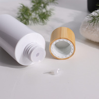 Emballage de bouteille de toner de visage de soins de la peau cosmétiques de couvercle en bambou de luxe 100ml 150ml bouteille de toner facial en plastique