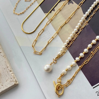 Collier ras du cou de luxe vintage avec pendentif perle et chaîne dorée, design original pour femme