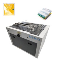 Machine automatique d'emballage pliable pour t-shirt, sweat, pantalon, poloshirt, vêtements, vêtements, avec écran tactile