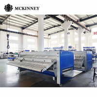 Machine à plier le linge industrielle automatique MCKINNEY 3300 mm pour la literie d'hôtel