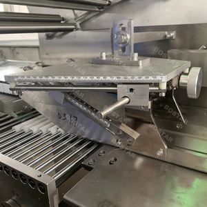 Machine d'emballage automatique de type coussin Qingdao Bostar Flow pour biscuits/pain/bonbons/sucreries - Product Image 2