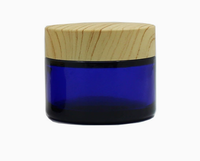 Bouteille de conservation en verre écologique de 50g avec couvercle en bambou, design moderne, empilable, compatible lave-vaisselle, préservation de la fraîcheur pour les entreprises