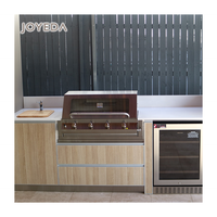 Cuisine modulaire d'extérieur en acier inoxydable et bois avec évier, barbecue et design ignifuge