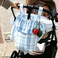 Solution de rangement moderne : Pochette mobile élégante à motifs, fixation polyvalente, idéale pour les voyages en avion, sac à couches pour maman et poussette