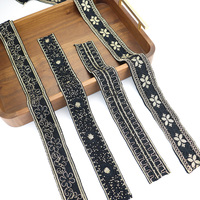 Garniture de dentelle brodée noire en polyester de haute qualité avec paillettes et perles dorées