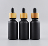 Couvercle en bois 5ml 10 ml 15ml 20 ml 30 ml 50ml 100ml 1 oz 30 ml huile essentielle sérum compte-gouttes en verre flacon noir opaque avec bouchon en bambou