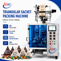 Machine d'emballage automatique de sachets triangulaires en film filtrant en nylon pour le thé, le café et les produits à base de plantes