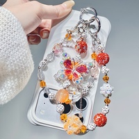 Breloque de téléphone en strass et perles, motif papillon orange et étoile, pendentif de sac artisanal, cordon de poignet, cadeau bijou pour femme