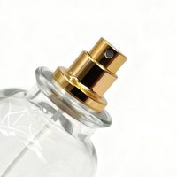 Flacon de parfum en verre cylindrique d'inspiration vintage avec pulvérisateur à pompe circulaire, atomiseur à pression, vente en gros, directement de l'usine