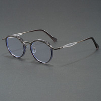 Vente en gros en Chine de lunettes de vue optiques anti-lumière bleue avec monture en métal et verres ronds ultralégers
