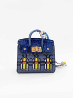 Petit sac de maison le plus vendu avec cuir PU, multicolore, couleur platine, porte-clés, petit sac, pendentif