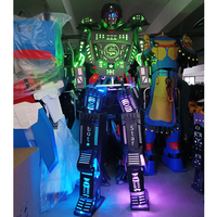 Guangzhou Enjoyment Accessoires de costume personnalisés pour performance sur échasses pour adultes, avec robot LED lumineux, pour discothèque, carnaval et fête