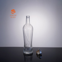Bouteille à spiritueux en verre clair personnalisée de 700 ml, forme incurvée unique, bouteille en verre pour la vodka, le brandy, le whisky