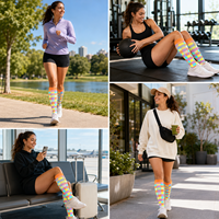 Chaussettes hautes à carreaux colorées pour femmes, chaussettes longues élastiques et douces, chaussettes élégantes à motif à carreaux pour un usage quotidien et le sport