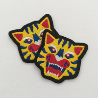 Patch brodé personnalisé en gros avec logo, motif tigre de dessin animé tendance pour vêtements