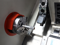 Centre d'usinage CNC robuste TCK50Y avec fonctions de fraisage, perçage et tournage, moteur GSK Fanuc, outils motorisés horizontaux, alimentation 220V, banc incliné