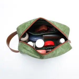Wingtu yeni tasarım Premium su geçirmez kağıt fermuar pamuk işlemeli kozmetik çantası Logo özel çizgili kozmetik çantası