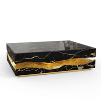 Nouvelle table basse de luxe en marbre noir avec veines dorées pour une décoration intérieure élégante