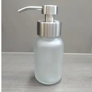 Distributeur de savon à tête de pompe en acier inoxydable en gros buse de bouteille de lotion pour les mains avec surface d'impression sérigraphique approvisionnement du fabricant