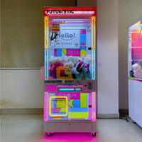 Jouet en peluche Machine Arcade Grue Griffe Machine Jeux à jetons dans un terrain de jeu d'amusement à vendre