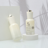 Bouteilles rondes de sérum en verre de luxe de 30ml 45ml 1oz en gros compte-gouttes à bouton-poussoir vide huile essentielle et crème de soin de la peau goutte pour les yeux