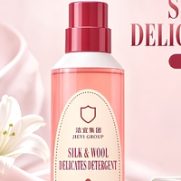 Détergent à lessive délicat en bouteille cylindrique rose corail, soie et laine, parfum longue durée, détergent liquide, produits de lavage