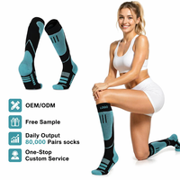 Chaussettes de ski personnalisées en laine mérinos tricotées pour jeunes, avec logo sur le bas, hauteur genou, thermiques, compressives et amortissantes, vente en gros OEM