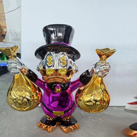 Statue de canard décorative en résine multicolore Pop Arts Canard chromé avec sac d'argent Sculpture pour décoration intérieure