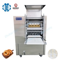 Machine électrique à couper et à arrondir les boules de pâte, haute efficacité pour la production de croissants, de pains à burger et de snacks.