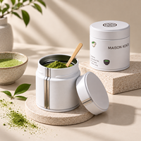 Boîtes en métal rondes noires mates de qualité alimentaire avec couvercle, personnalisables pour café et thé, idéales pour la vente en gros et l'impression de motifs.