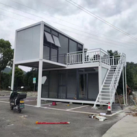 Maison conteneur préfabriquée modulaire à deux étages avec balcon et fenêtres en verre, villa préfabriquée portable