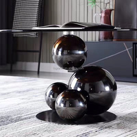 Table basse combinée en verre trempé rond avec base en acier inoxydable noir, style moderne et luxueux pour salon ou hôtel