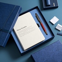 Individueller Notizbuchdruck Hardcover-Journal mit Riemenverschluss Drahtbindung Beschichtetes Papier OEM China Hersteller