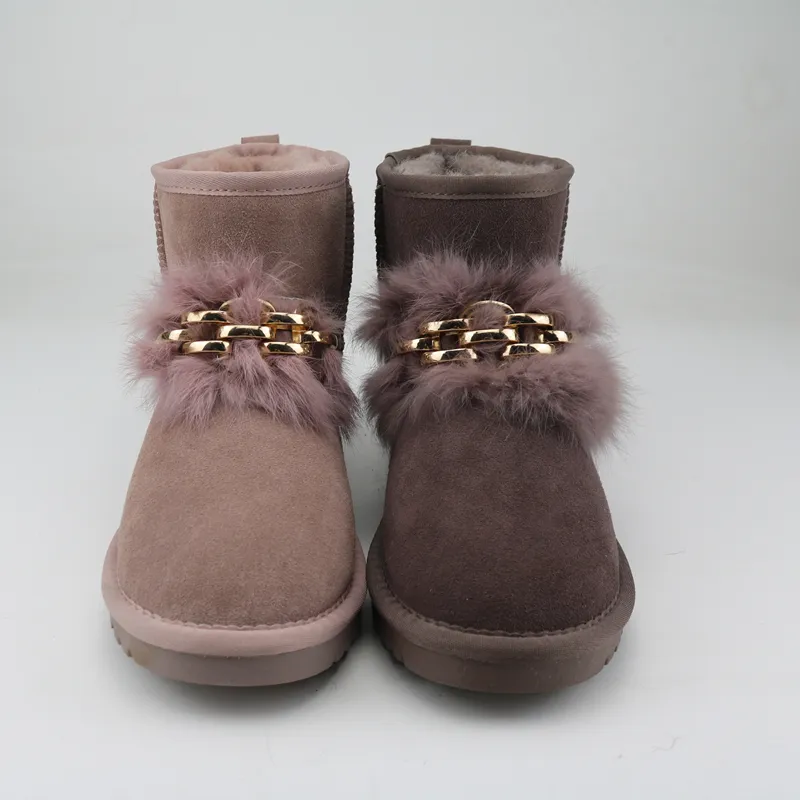 women pink boots with fur upper