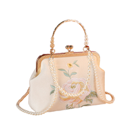 Sac à main de créateur original style chinois traditionnel motif peau de serpent, tendance et polyvalent avec bandoulière chaîne, capacité 2-2,9 L
