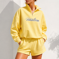 Ensemble de survêtement sport deux pièces pour femme, personnalisé, style vintage oversize, avec sweat-shirt à col montant semi-zippé et imprimé sérigraphié, et short décontracté