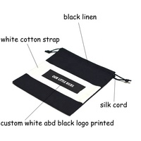 Sac en mousseline de lin noir en gros avec cordon de serrage et patch logo blanc