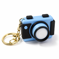 Nouveau Porte-clés personnalisé OEM en gros, imprimé en 3D, avec bouton de déclenchement de caméra et interrupteur mécanique, jouet anti-stress, pendentif en forme de bouton de déclenchement, pour cadeaux en vrac