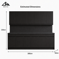 Ensemble d'armoires de cuisine noir mat avec portes à plat, façades à ouverture par pression, charnières à fermeture amortie et pied de meuble encastré