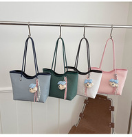 Nouveau sac fourre-tout pour femme en PU tendance, couleur unie, grande capacité, résistant à l'eau, portable, à porter sur l'épaule, pour les voyages et l'usage quotidien
