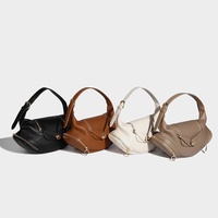 Automne hiver nouvelle mode sac à main polyvalent coeur serrure Niche conception sous les bras fermeture éclair doux dames personnalisé voyage sac à main