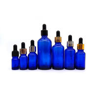 Pipette en verre bleu personnalisable de 5 ml, 10 ml, 20 ml, 30 ml, 50 ml, 100 ml, 200 ml, réutilisable, pour l'emballage d'huiles essentielles