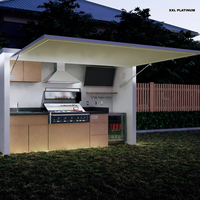 Système d'armoires de cuisine extérieures en acier inoxydable étanche au design moderne pour appartement, avec comptoir en granit, évier, robinet et barbecue à gaz