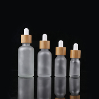 Emballage pour soins de la peau, flacon en verre givré opaque avec compte-gouttes en bambou et bouchon en bois pour huile essentielle et crème pour le visage