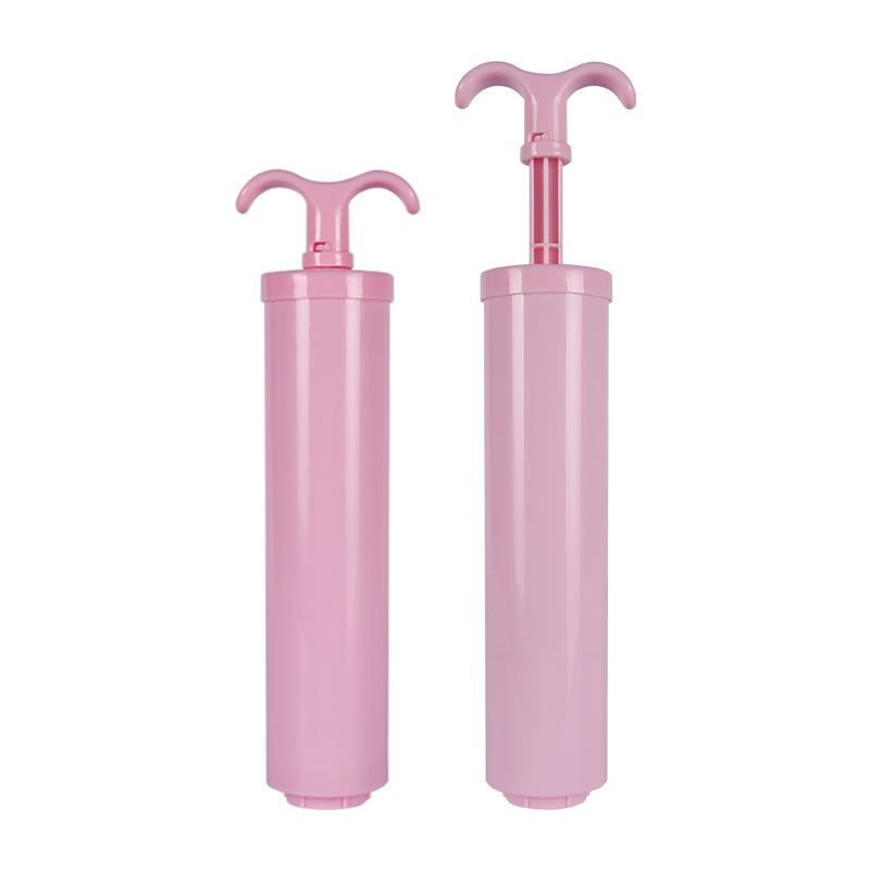 Pompe à main en plastique rose