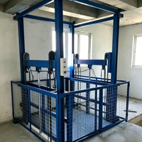Plateforme élévatrice verticale hydraulique sur rail pour le levage de marchandises stationnaires dans les entrepôts logistiques et l'expédition de fret entre niveaux
