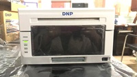 Nouvelle collection 2026 : Housse et support d'imprimante DNP DS620 avec plateau photo intégré pour borne photo