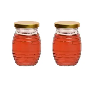 可回收批发蜂窝形状透明空70毫升180毫升380毫升500毫升独特的玻璃蜂蜜包装瓶盖