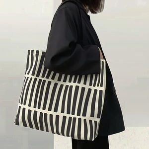 Bolso para portátil de lona impermeable con correa grande para un viaje cómodo y de calidad razonable - Product Image 3