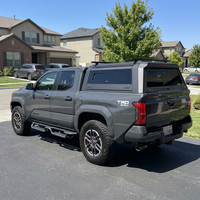 Auvent de camionnette en alliage d'aluminium noir avec panneaux latéraux à charnières, fenêtre arrière et porte-bagages intégré pour 4x4 tout-terrain